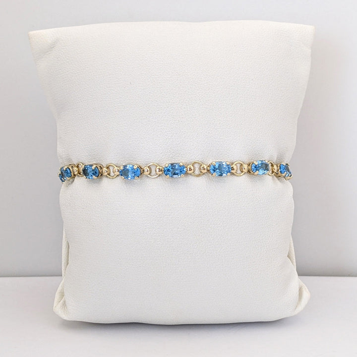 10K BLUE TOPAZ OVAL 4X6 (14) ESTATE BRACELET 5.4 GRAMS