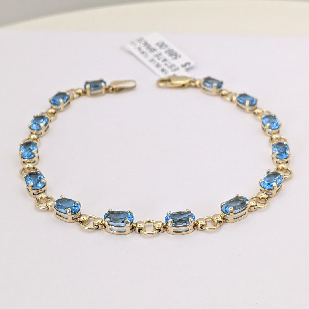 10K BLUE TOPAZ OVAL 4X6 (14) ESTATE BRACELET 5.4 GRAMS