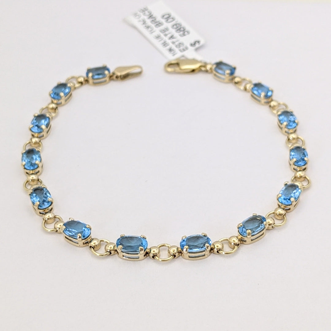 10K BLUE TOPAZ OVAL 4X6 (14) ESTATE BRACELET 5.4 GRAMS