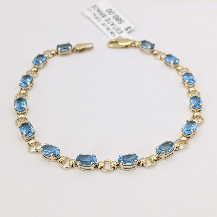 10K BLUE TOPAZ OVAL 4X6 (14) ESTATE BRACELET 5.4 GRAMS