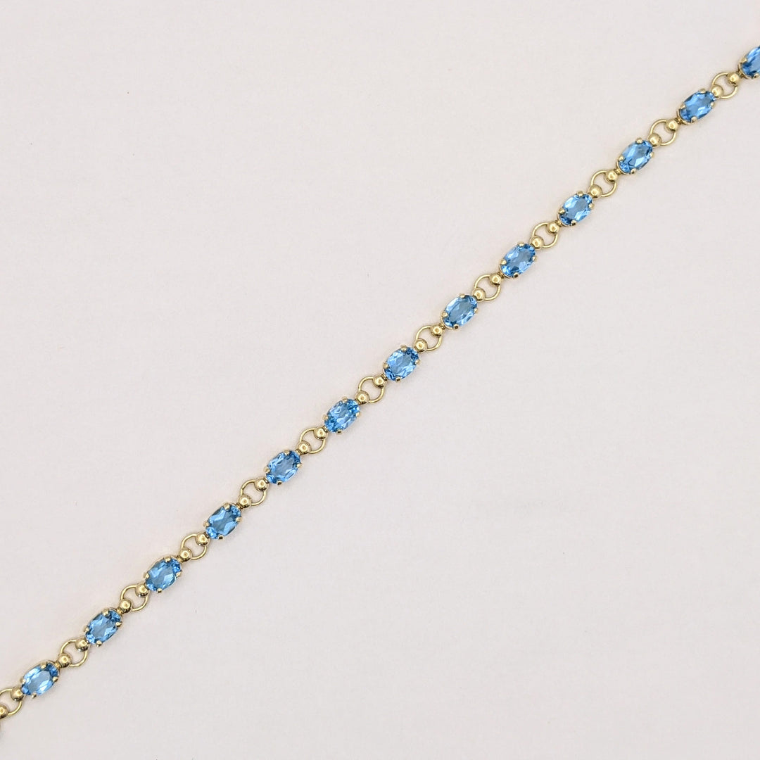 10K BLUE TOPAZ OVAL 4X6 (14) ESTATE BRACELET 5.4 GRAMS