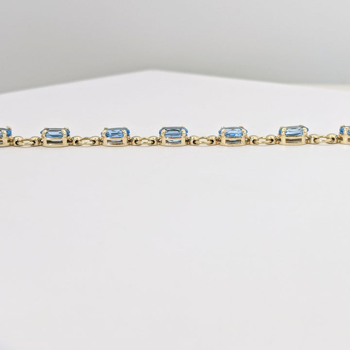 10K BLUE TOPAZ OVAL 4X6 (14) ESTATE BRACELET 5.4 GRAMS