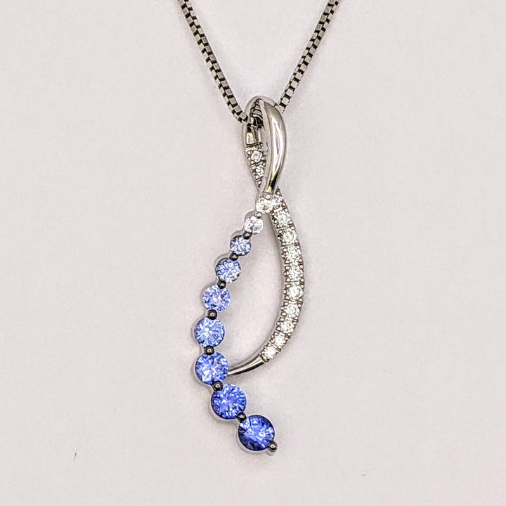 14K WHITE SAPPHIRE (9) ROUND WHITE/BLUE WITH .20 DIAMOND TOTAL WEIGHT RIBBON ESTATE PENDANT &amp; CHAIN 5.0 GRAMS