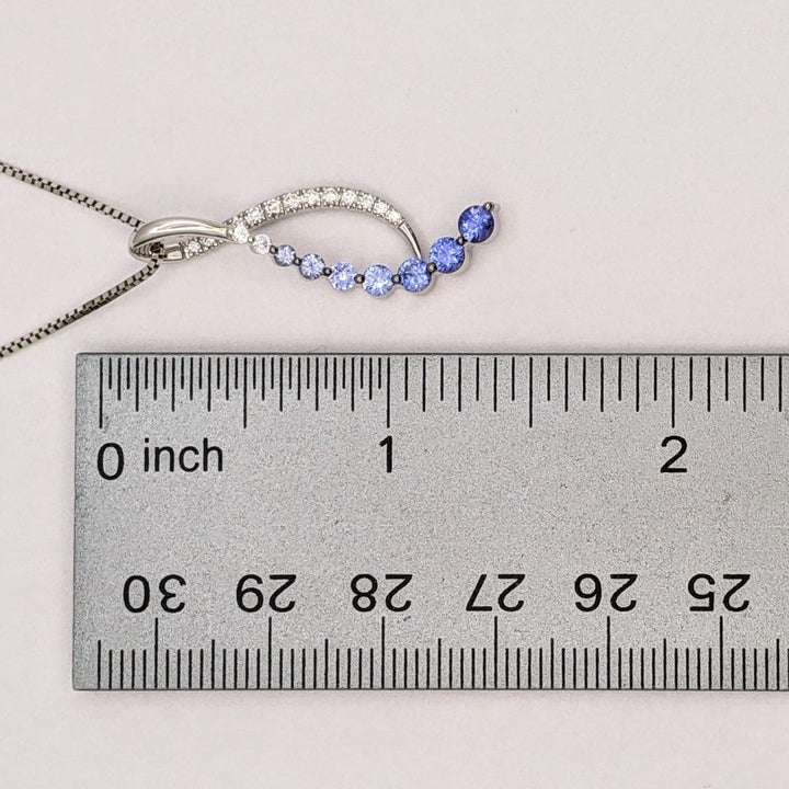 14K WHITE SAPPHIRE (9) ROUND WHITE/BLUE WITH .20 DIAMOND TOTAL WEIGHT RIBBON ESTATE PENDANT &amp; CHAIN 5.0 GRAMS