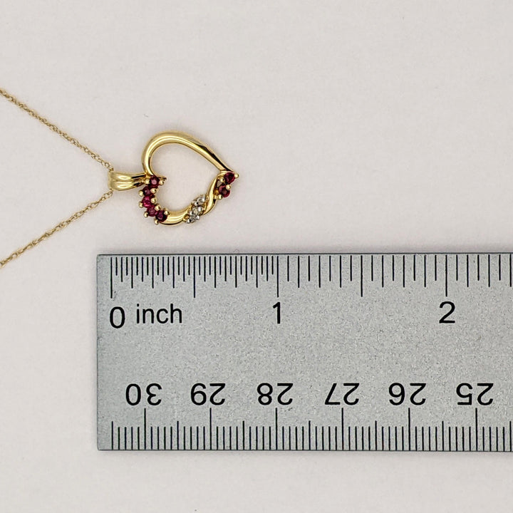 10K RUBY ROUND (7) DIAMOND ROUND (2) ESTATE OPEN HEART PENDANT &amp; CHAIN 2.0 GRAMS