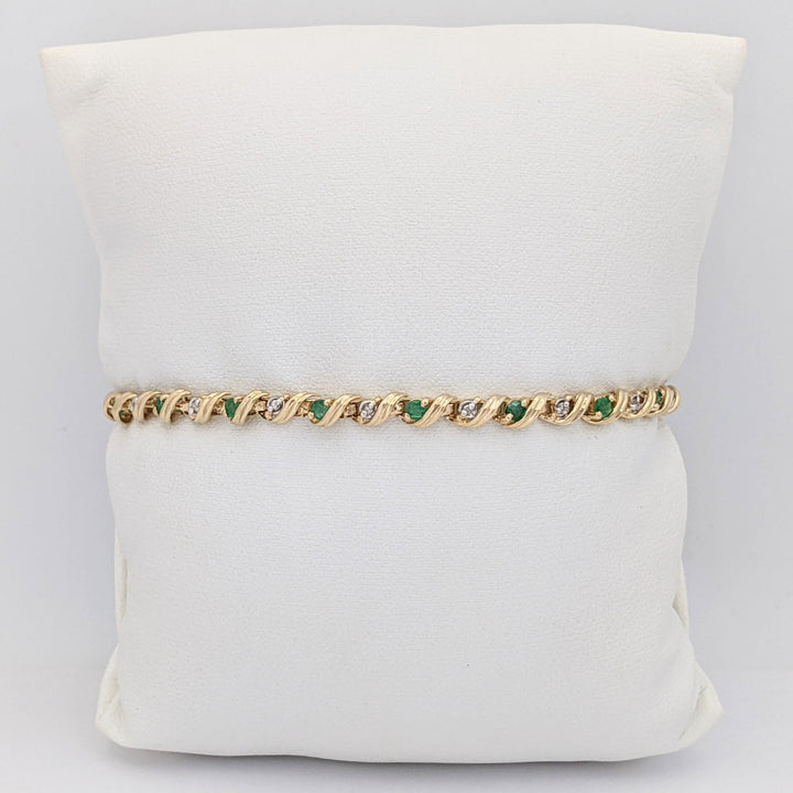 10K EMERALD ROUND (16) 2.5MM WITH .08 DIAMOND TOTAL WEIGHT (16) ROUND ESTATE BRACELET 6.0 GRAMS