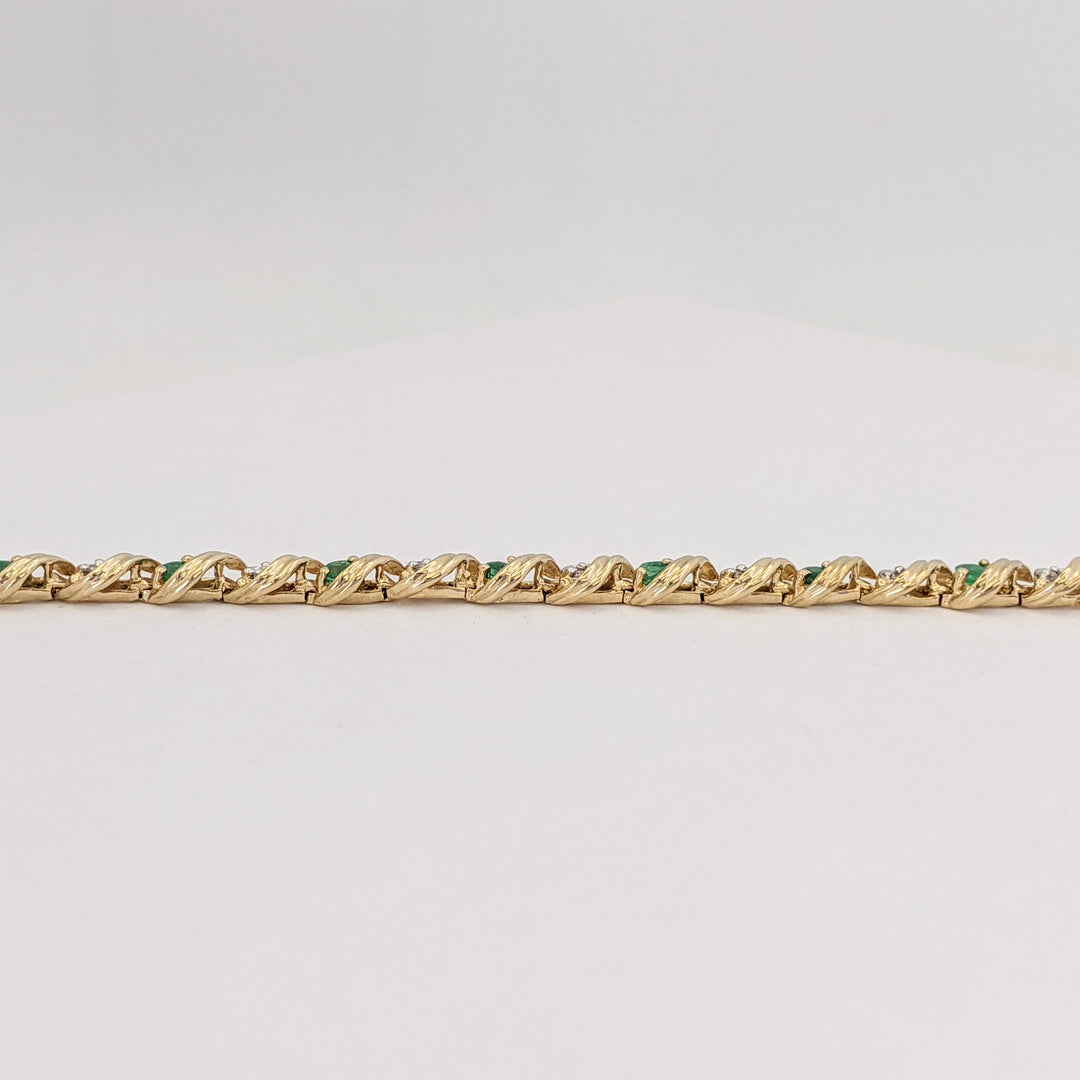 10K EMERALD ROUND (16) 2.5MM WITH .08 DIAMOND TOTAL WEIGHT (16) ROUND ESTATE BRACELET 6.0 GRAMS