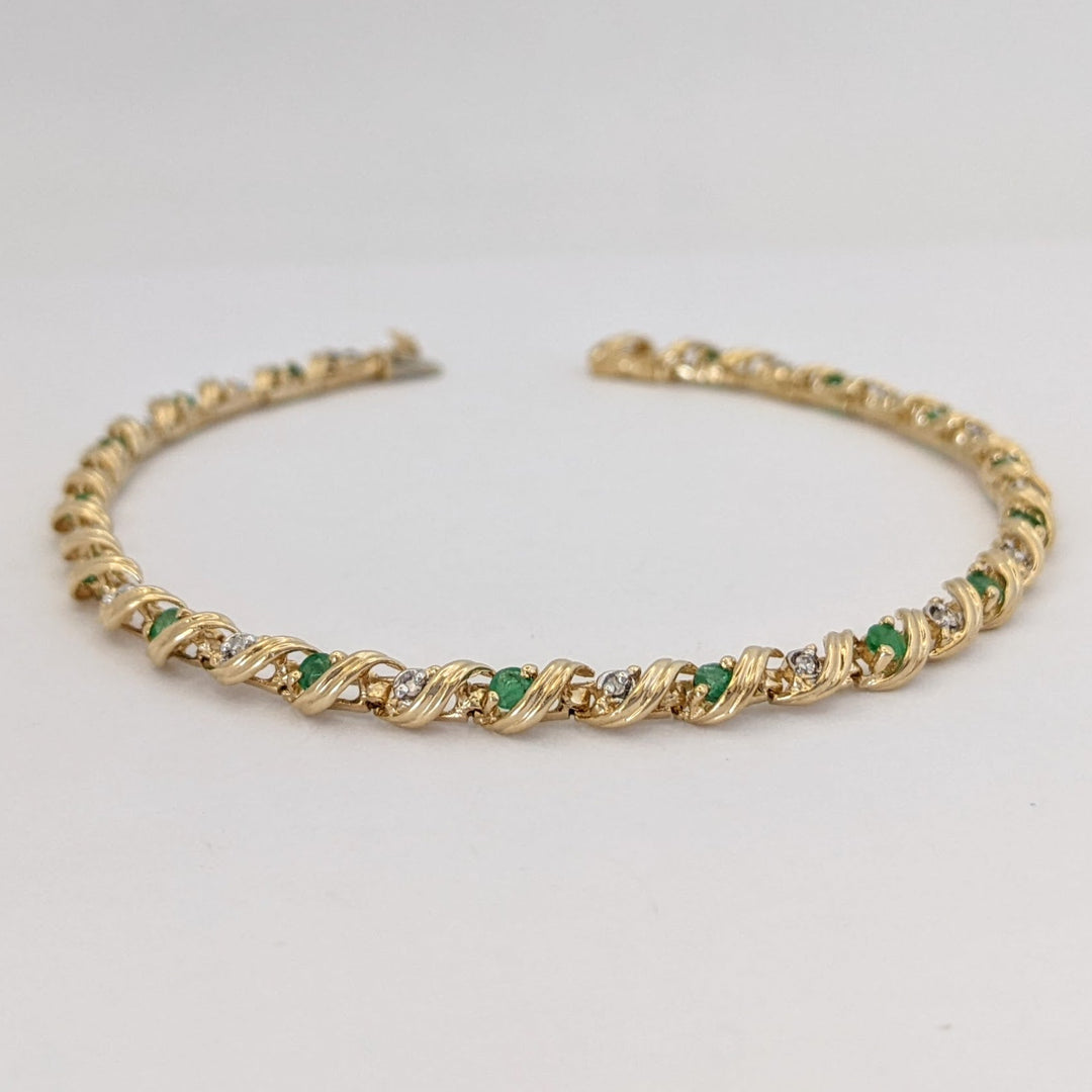 10K EMERALD ROUND (16) 2.5MM WITH .08 DIAMOND TOTAL WEIGHT (16) ROUND ESTATE BRACELET 6.0 GRAMS