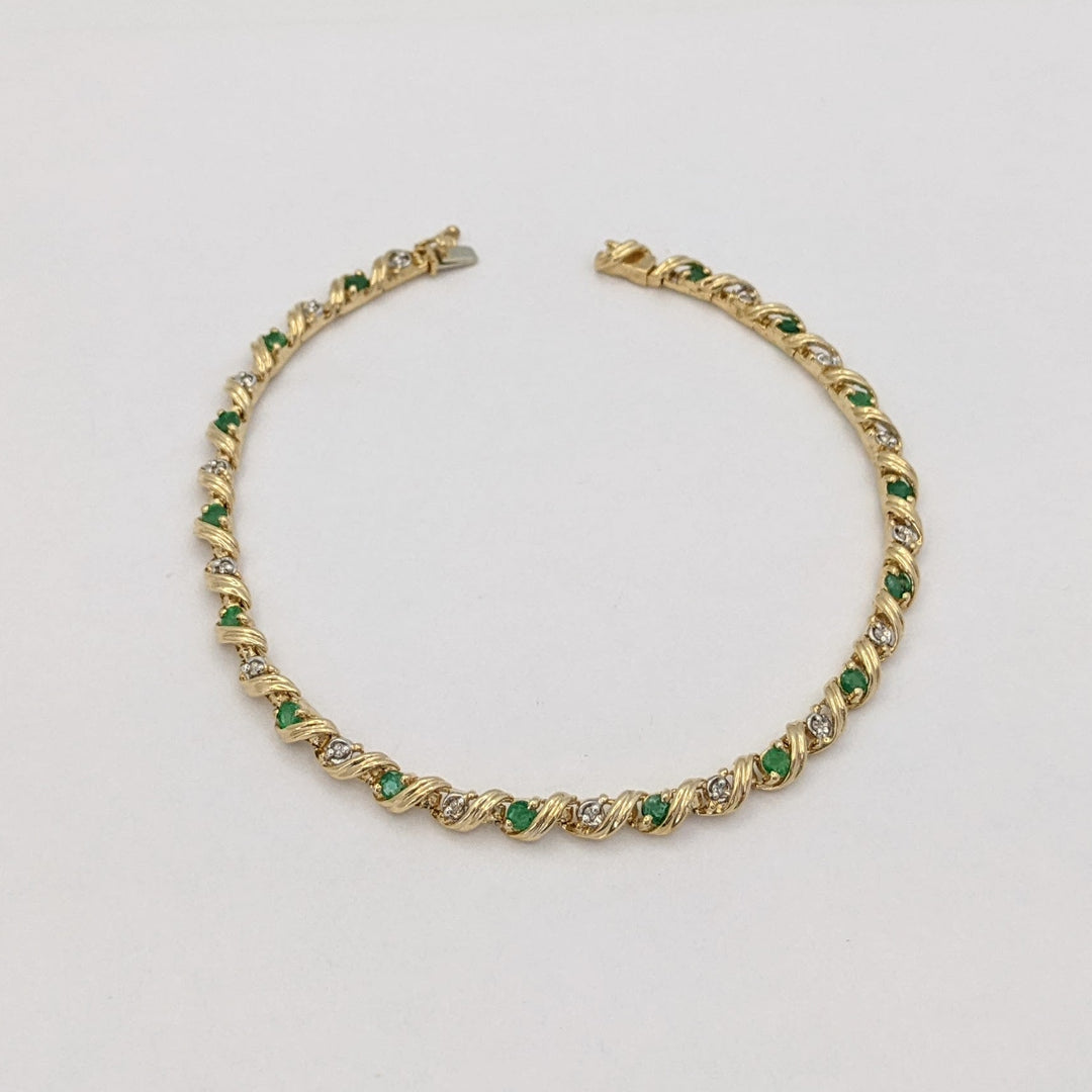 10K EMERALD ROUND (16) 2.5MM WITH .08 DIAMOND TOTAL WEIGHT (16) ROUND ESTATE BRACELET 6.0 GRAMS