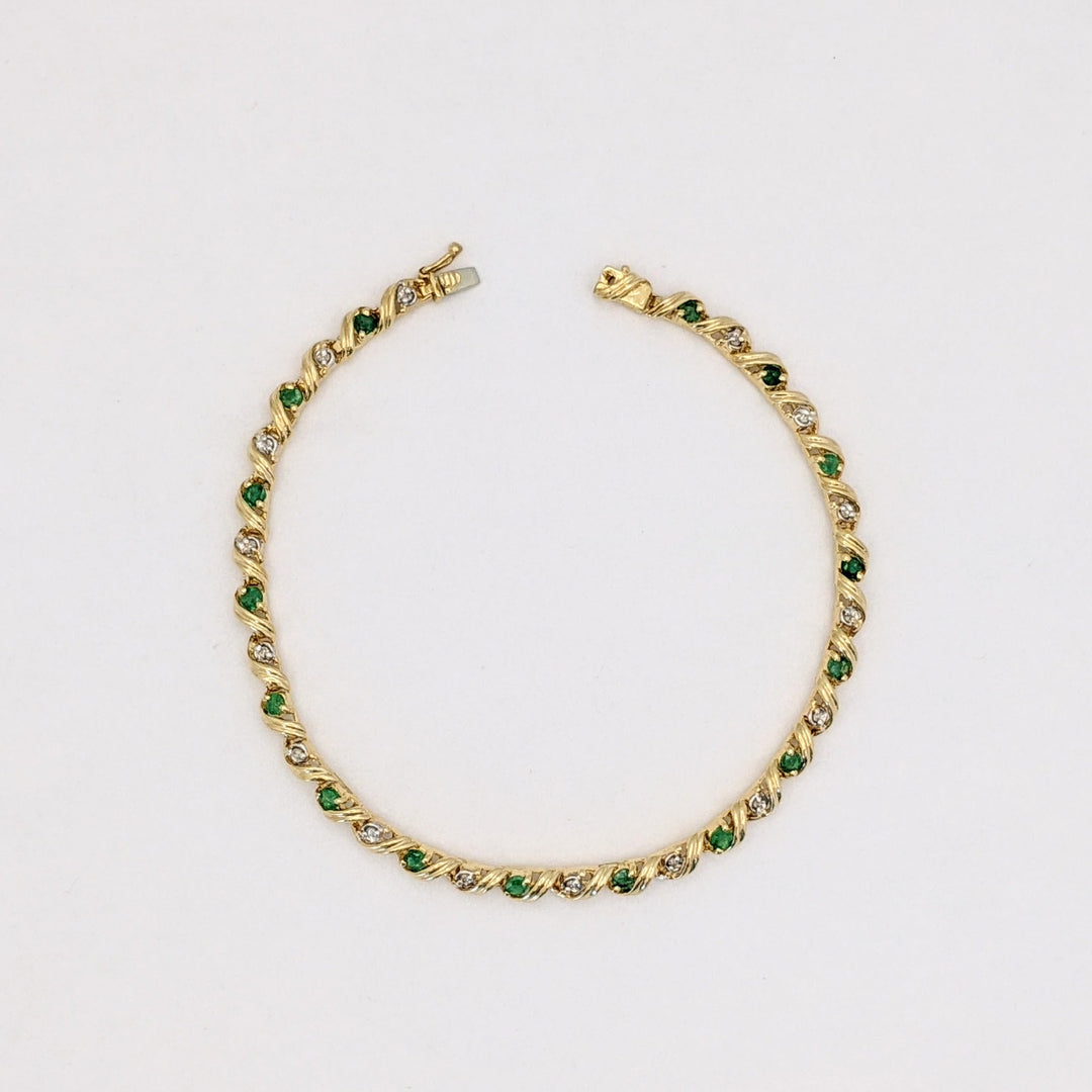 10K EMERALD ROUND (16) 2.5MM WITH .08 DIAMOND TOTAL WEIGHT (16) ROUND ESTATE BRACELET 6.0 GRAMS