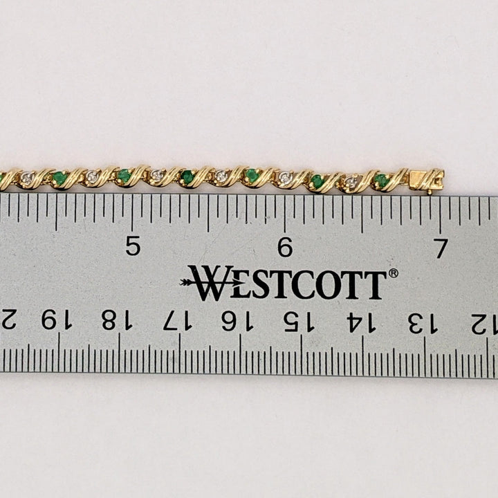 10K EMERALD ROUND (16) 2.5MM WITH .08 DIAMOND TOTAL WEIGHT (16) ROUND ESTATE BRACELET 6.0 GRAMS