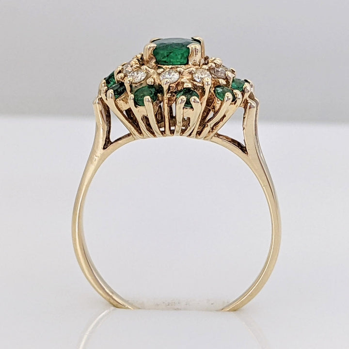 14K EMERALD OVAL 4.5X6 WITH (10) ROUND AND .20 DIAMOND TOTAL WEIGHT (10) ROUND ESTATE RING 3.2 GRAMS