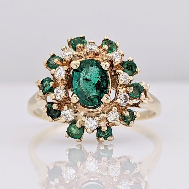 14K EMERALD OVAL 4.5X6 WITH (10) ROUND AND .20 DIAMOND TOTAL WEIGHT (10) ROUND ESTATE RING 3.2 GRAMS
