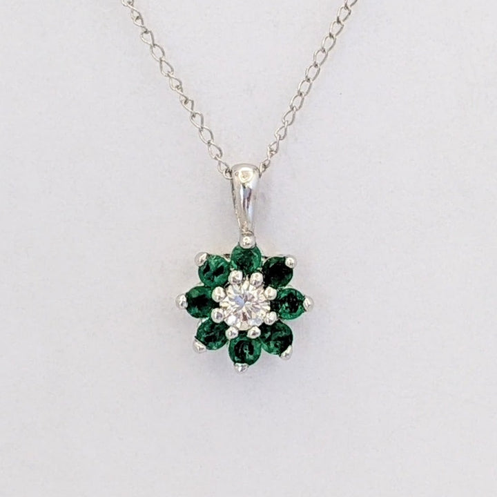 14K WHITE EMERALD ROUND (8) 2MM WITH .10 DIAMOND TOTAL WEIGHT (2) ROUND FLORAL ESTATE PENDANT &amp; CHAIN 1.6 GRAMS