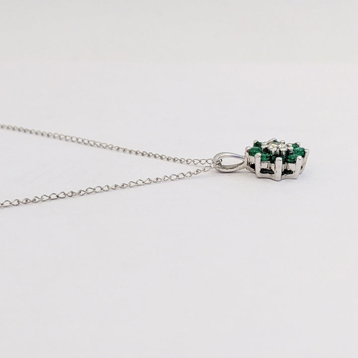 14K WHITE EMERALD ROUND (8) 2MM WITH .10 DIAMOND TOTAL WEIGHT (2) ROUND FLORAL ESTATE PENDANT &amp; CHAIN 1.6 GRAMS