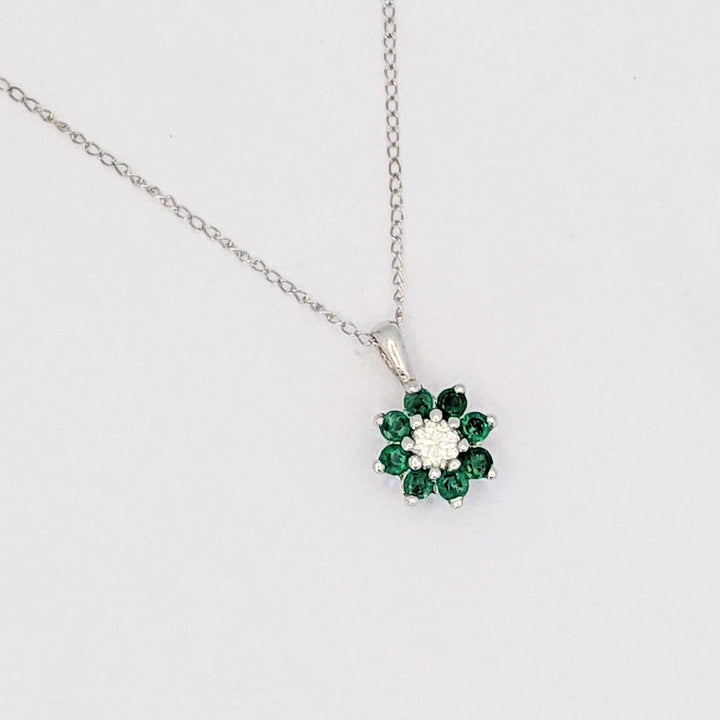 14K WHITE EMERALD ROUND (8) 2MM WITH .10 DIAMOND TOTAL WEIGHT (2) ROUND FLORAL ESTATE PENDANT &amp; CHAIN 1.6 GRAMS