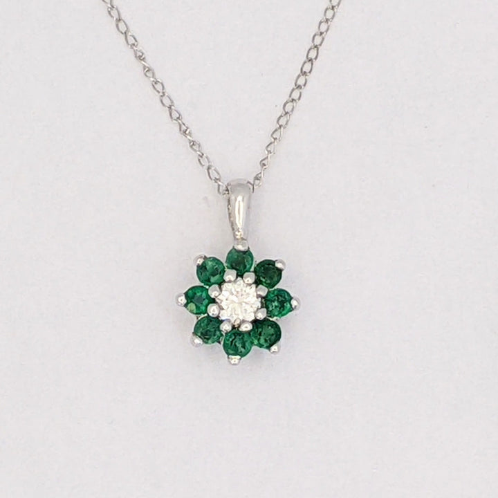 14K WHITE EMERALD ROUND (8) 2MM WITH .10 DIAMOND TOTAL WEIGHT (2) ROUND FLORAL ESTATE PENDANT &amp; CHAIN 1.6 GRAMS