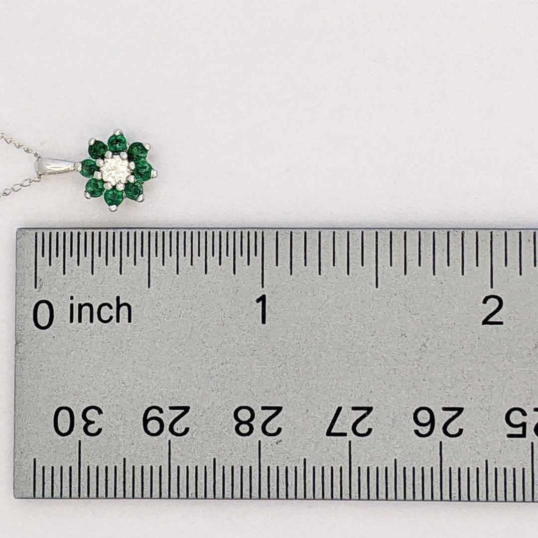 14K WHITE EMERALD ROUND (8) 2MM WITH .10 DIAMOND TOTAL WEIGHT (2) ROUND FLORAL ESTATE PENDANT &amp; CHAIN 1.6 GRAMS