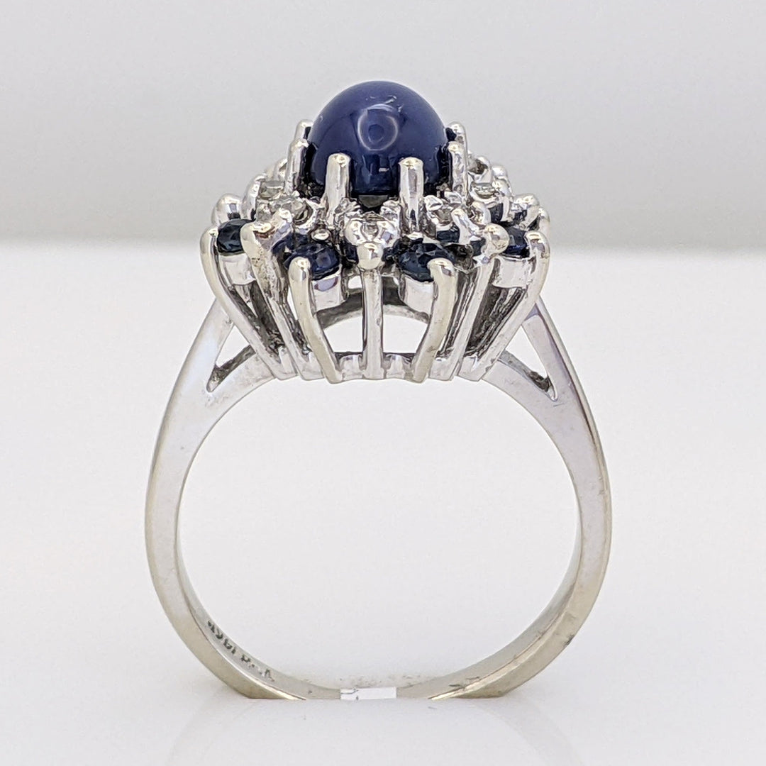 14K WHITE LAB-CREATED STAR SAPPHIRE OVAL WITH (8) 2.2MM SAPPHIRE ROUND AND .24 DIAMOND TOTAL WEIGHT (8) ROUND ESTATE RING 4.8 GRAMS