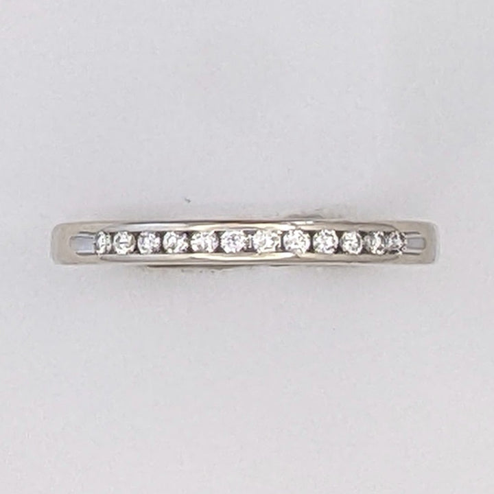 14K WHITE .09 CARAT TOTAL WEIGHT I1 I DIAMOND ROUND (12) ESTATE CHANNEL SET BAND 1.3 GRAMS