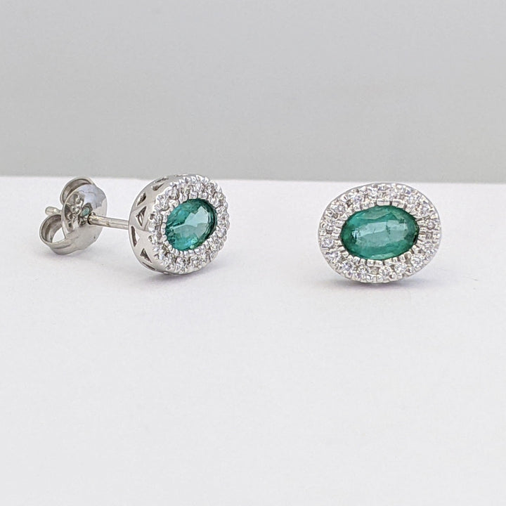 14K WHITE EMERALD OVAL 4X6 BEZEL WITH .15 DIAMOND TOTAL WEIGHT ESTATE EARRINGS 1.6 GRAMS