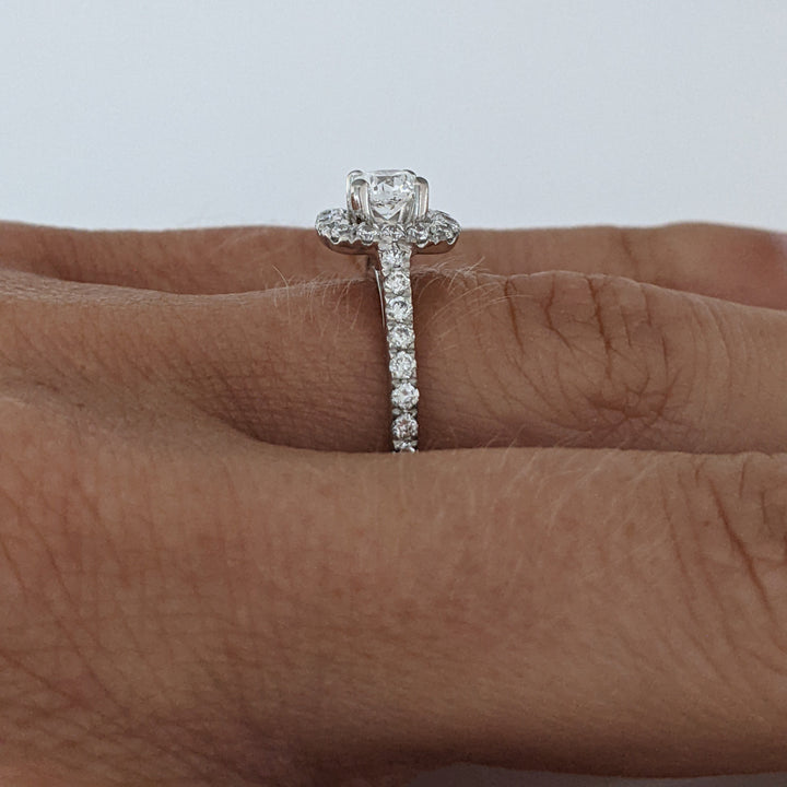 PLATINUM .86 CARAT TOTAL WEIGHT SI1 G DIAMOND ROUND (33) ESTATE HALO RING 3.8 GRAMS