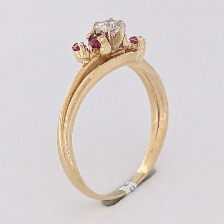 14K .25 CARAT TOTAL SI2 H DIAMOND ROUND (1) RUBY BAGUETTE (4) ESTATE RING 3.3 GRAMS