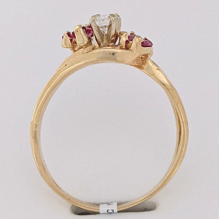 14K .25 CARAT TOTAL SI2 H DIAMOND ROUND (1) RUBY BAGUETTE (4) ESTATE RING 3.3 GRAMS