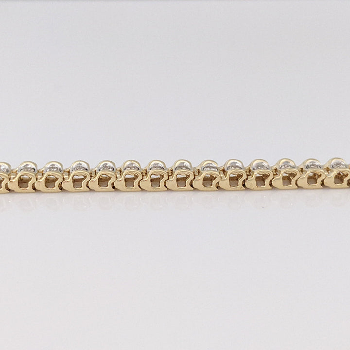 10K 1.02 CARAT TOTAL WEIGHT I1 K DIAMOND ROUND (56) ESTATE TENNIS BRACELET 8.2 GRAMS