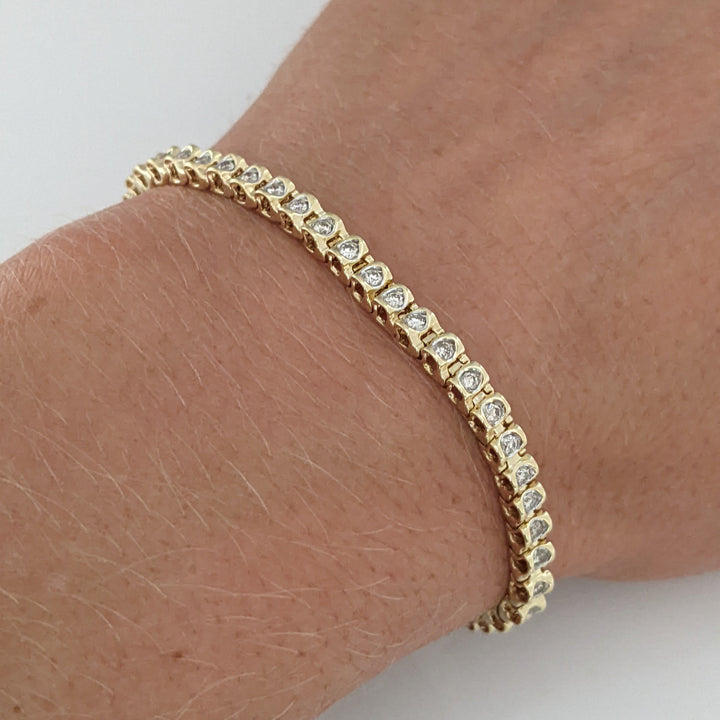 10K 1.02 CARAT TOTAL WEIGHT I1 K DIAMOND ROUND (56) ESTATE TENNIS BRACELET 8.2 GRAMS