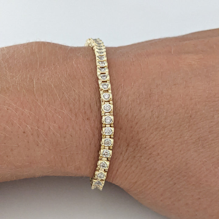 10K 1.02 CARAT TOTAL WEIGHT I1 K DIAMOND ROUND (56) ESTATE TENNIS BRACELET 8.2 GRAMS