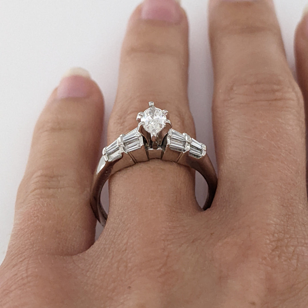 PLATINUM 1.06 CARAT TOTAL WEIGHT SI2 G-H MARQUISE DIAMOND WITH (12) BAGUETTE ESTATE RING 6.4 GRAMS