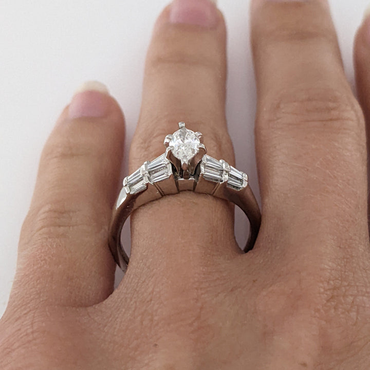 PLATINUM 1.06 CARAT TOTAL WEIGHT SI2 G-H MARQUISE DIAMOND WITH (12) BAGUETTE ESTATE RING 6.4 GRAMS