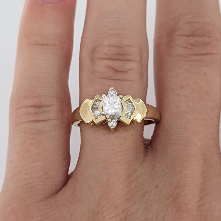 14K .49 CARAT TOTAL WEIGHT I1 H DIAMOND PRINCESS CUT WITH (12) BAGUETTE ESTATE RING 2.7 GRAMS