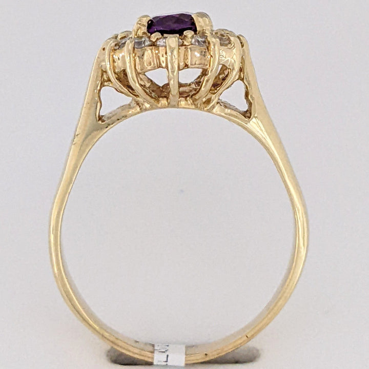14K AMETHYST OVAL 5X7 WITH .24 DIAMOND TOTAL WEIGHT (12) ESTATE RING 4.6 GRAMS