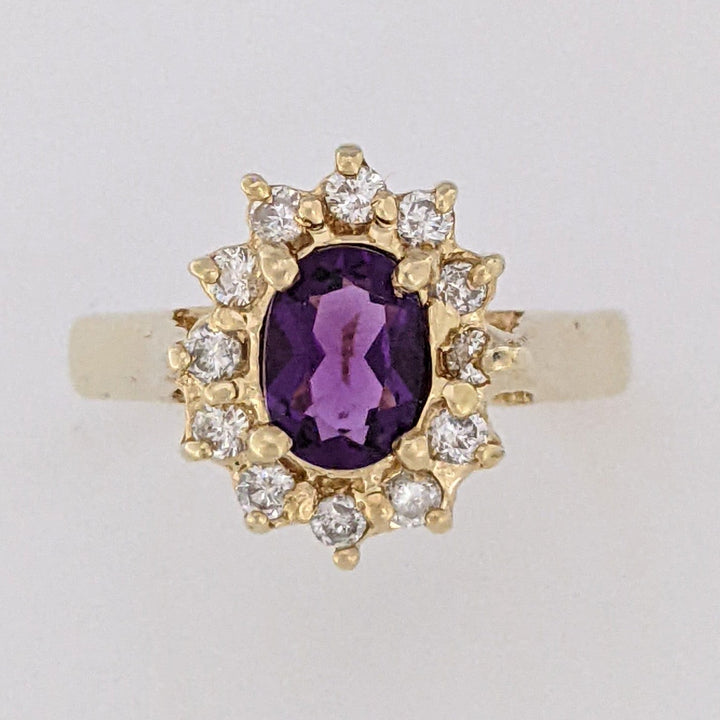 14K AMETHYST OVAL 5X7 WITH .24 DIAMOND TOTAL WEIGHT (12) ESTATE RING 4.6 GRAMS