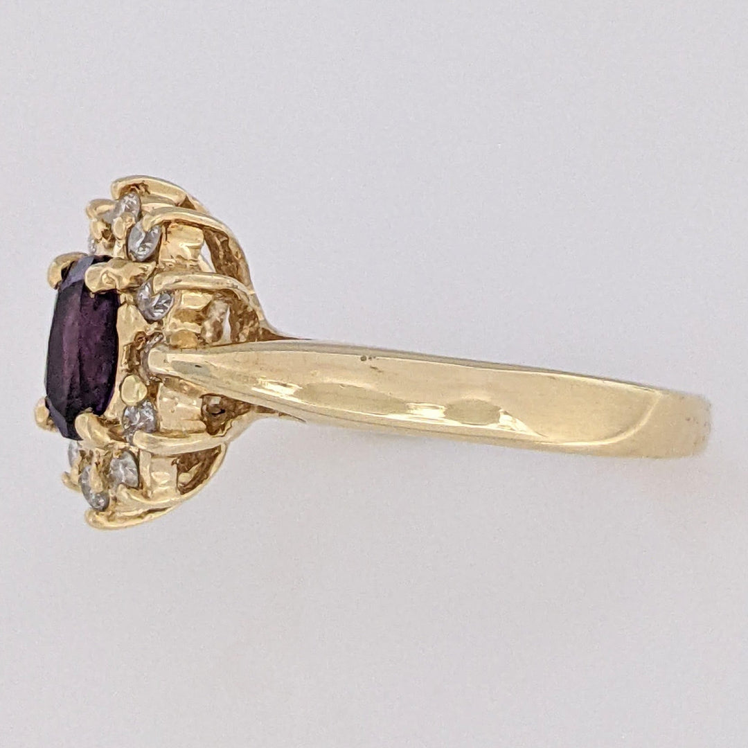 14K AMETHYST OVAL 5X7 WITH .24 DIAMOND TOTAL WEIGHT (12) ESTATE RING 4.6 GRAMS