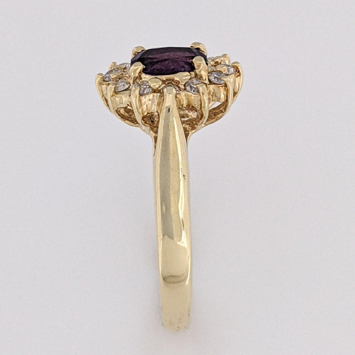 14K AMETHYST OVAL 5X7 WITH .24 DIAMOND TOTAL WEIGHT (12) ESTATE RING 4.6 GRAMS