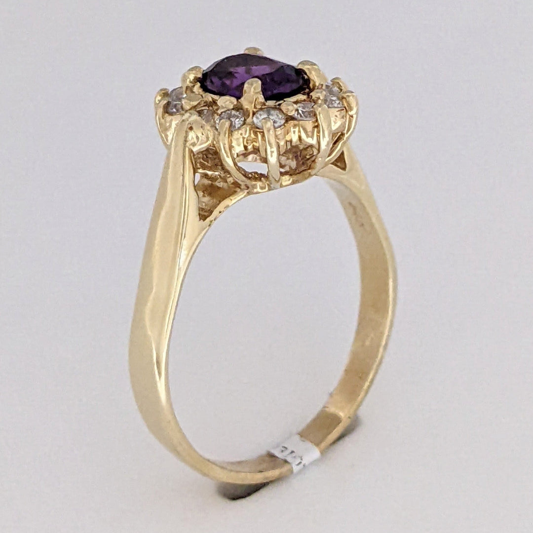 14K AMETHYST OVAL 5X7 WITH .24 DIAMOND TOTAL WEIGHT (12) ESTATE RING 4.6 GRAMS