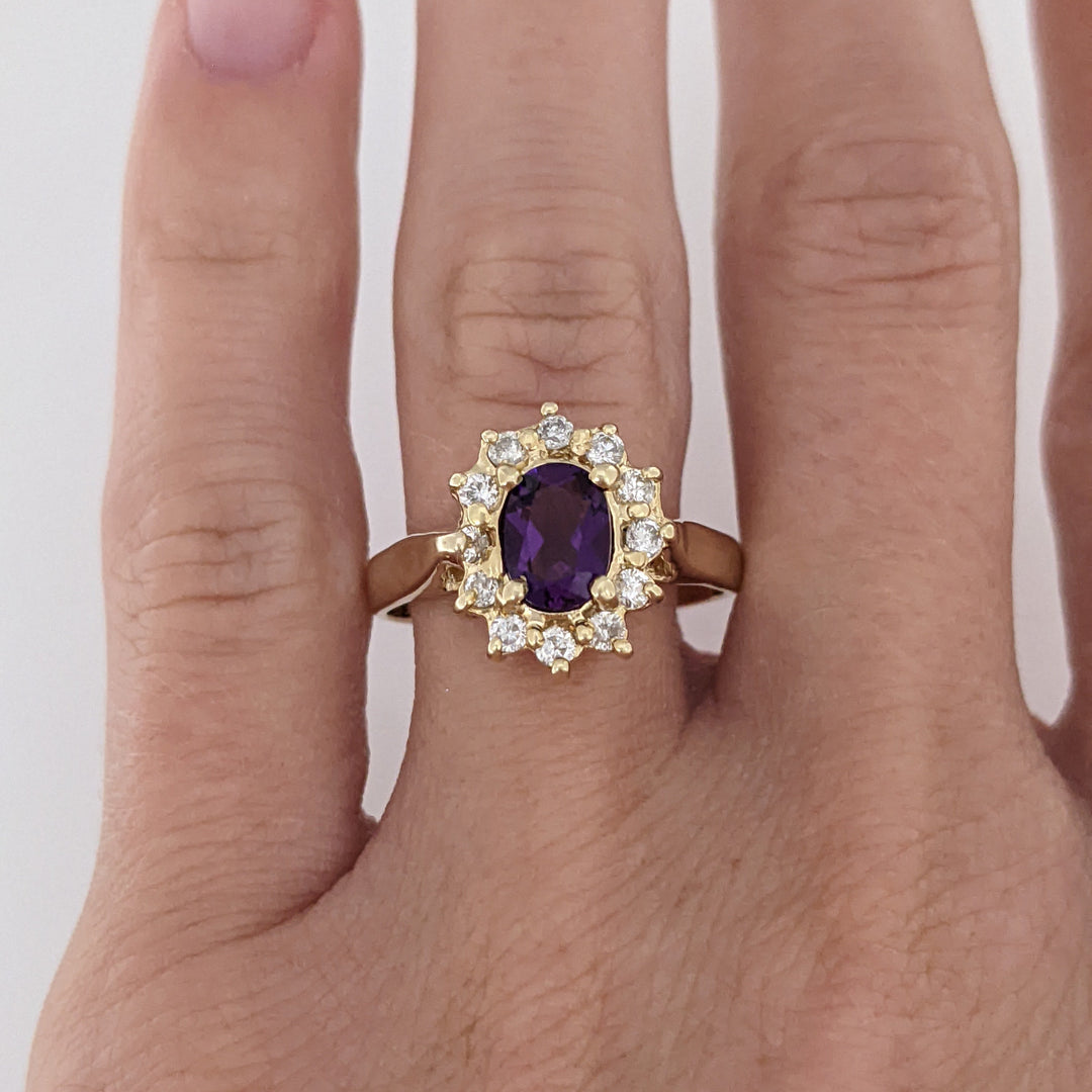 14K AMETHYST OVAL 5X7 WITH .24 DIAMOND TOTAL WEIGHT (12) ESTATE RING 4.6 GRAMS