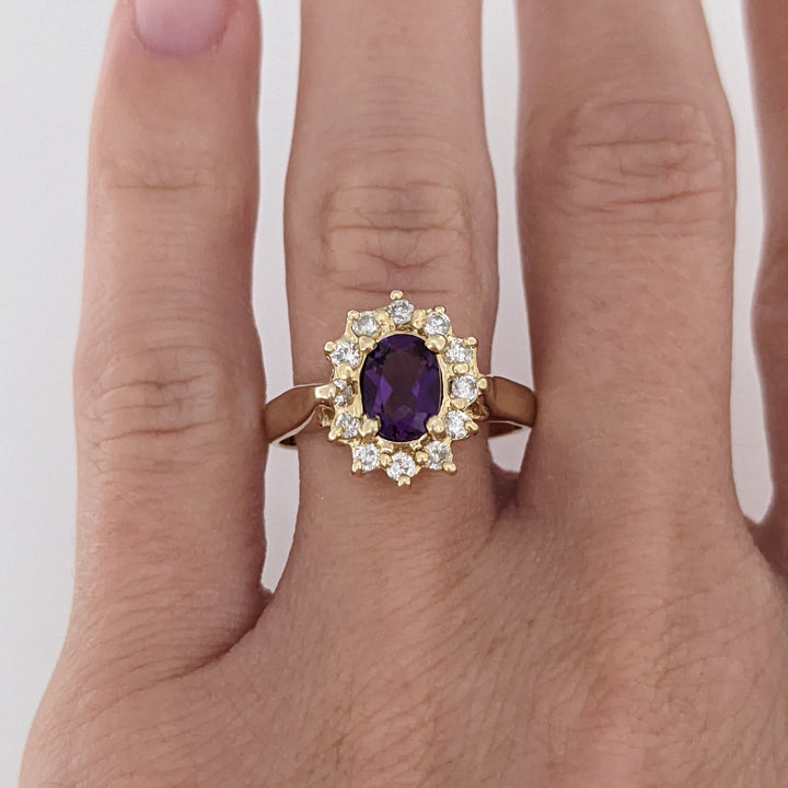 14K AMETHYST OVAL 5X7 WITH .24 DIAMOND TOTAL WEIGHT (12) ESTATE RING 4.6 GRAMS