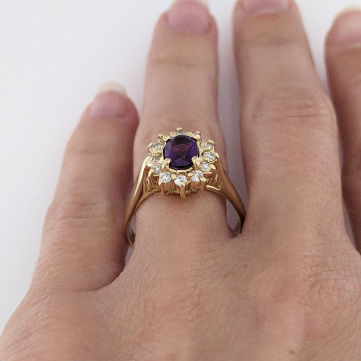 14K AMETHYST OVAL 5X7 WITH .24 DIAMOND TOTAL WEIGHT (12) ESTATE RING 4.6 GRAMS