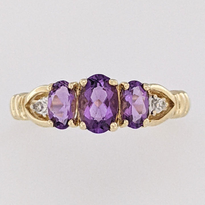 10K AMETHYST OVAL (3) WITH (2) MELEE ESTATE RING 2.0 GRAMS