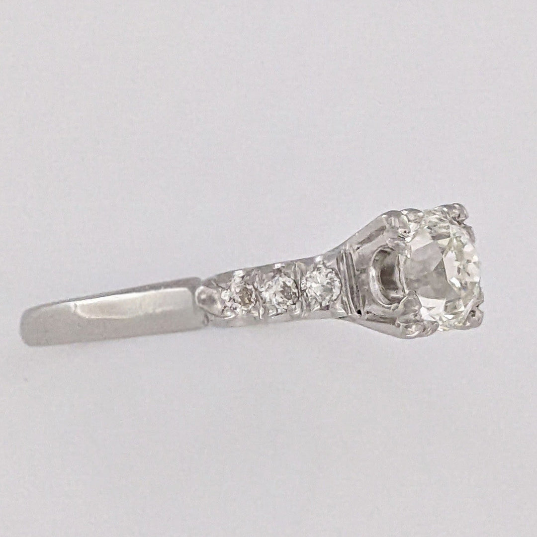 PLATINUM .72 CARAT TOTAL VS2 J DIAMOND ROUND WITH .12 DIAMOND TOTAL WEIGHT ESTATE RING 3.9 GRAMS