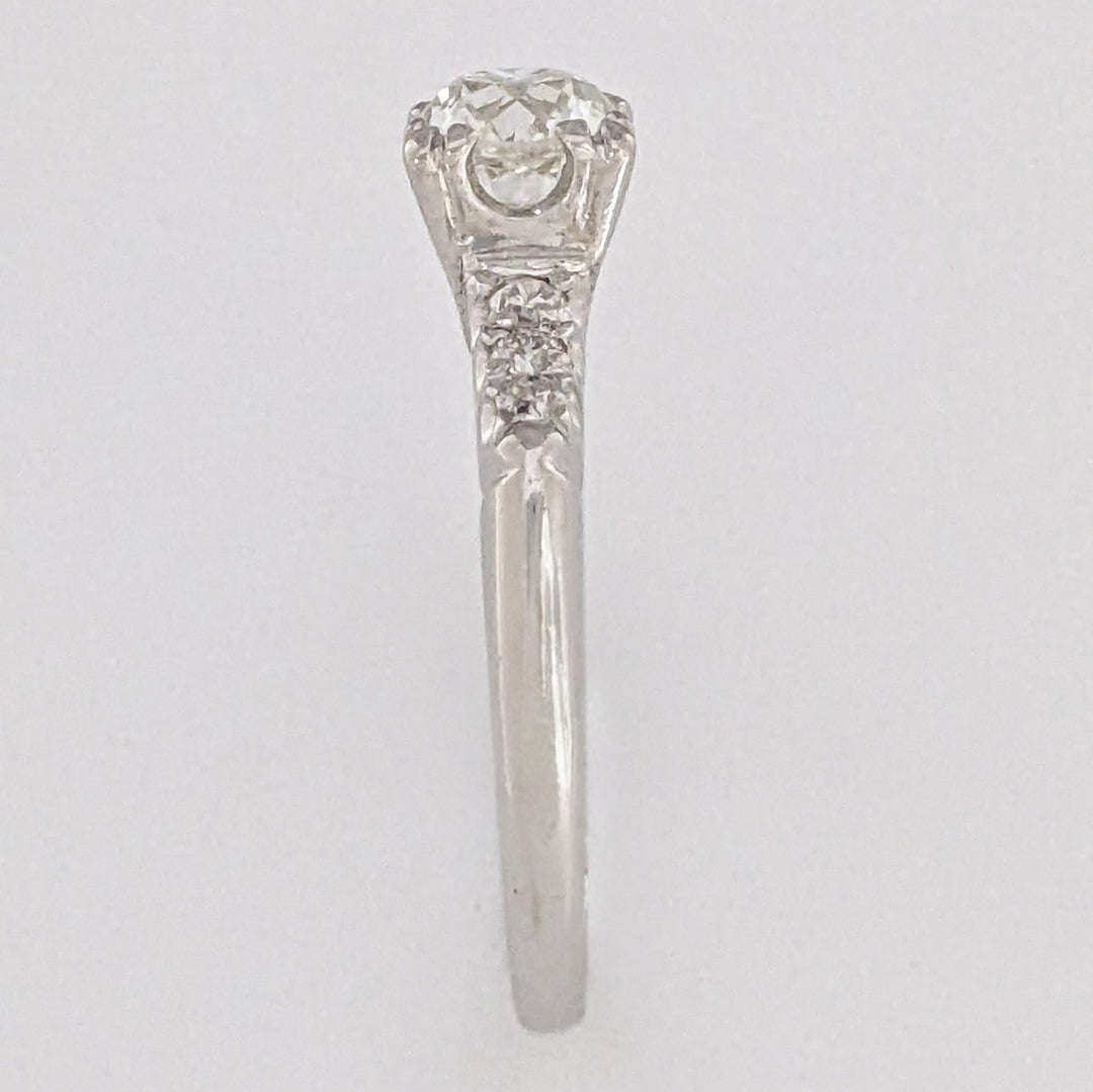 PLATINUM .72 CARAT TOTAL VS2 J DIAMOND ROUND WITH .12 DIAMOND TOTAL WEIGHT ESTATE RING 3.9 GRAMS
