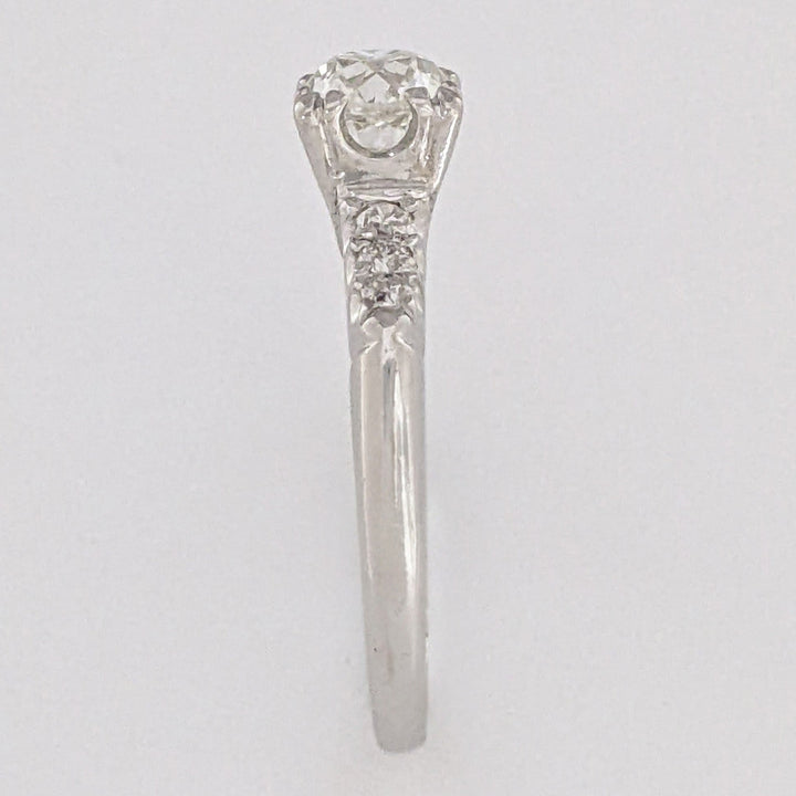 PLATINUM .72 CARAT TOTAL VS2 J DIAMOND ROUND WITH .12 DIAMOND TOTAL WEIGHT ESTATE RING 3.9 GRAMS