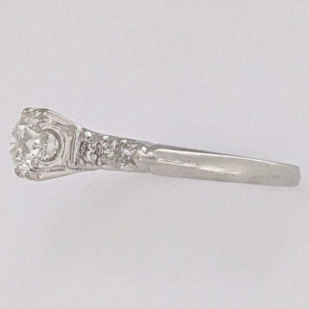 PLATINUM .72 CARAT TOTAL VS2 J DIAMOND ROUND WITH .12 DIAMOND TOTAL WEIGHT ESTATE RING 3.9 GRAMS