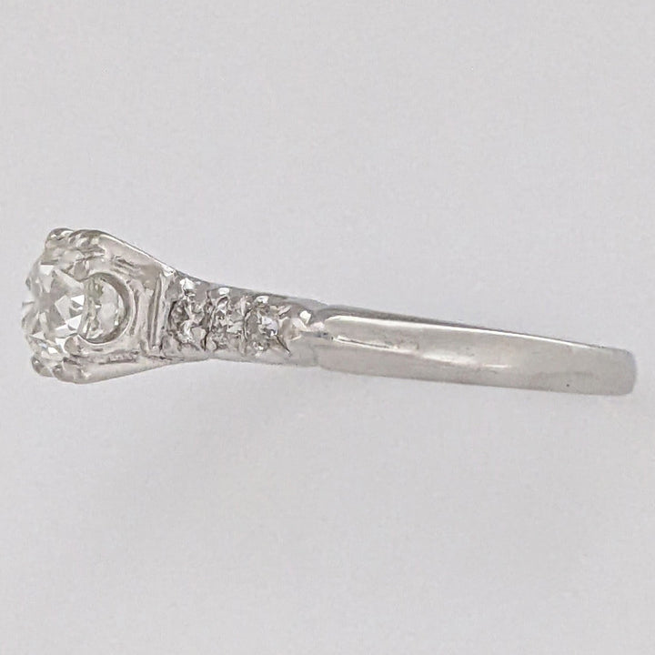 PLATINUM .72 CARAT TOTAL VS2 J DIAMOND ROUND WITH .12 DIAMOND TOTAL WEIGHT ESTATE RING 3.9 GRAMS