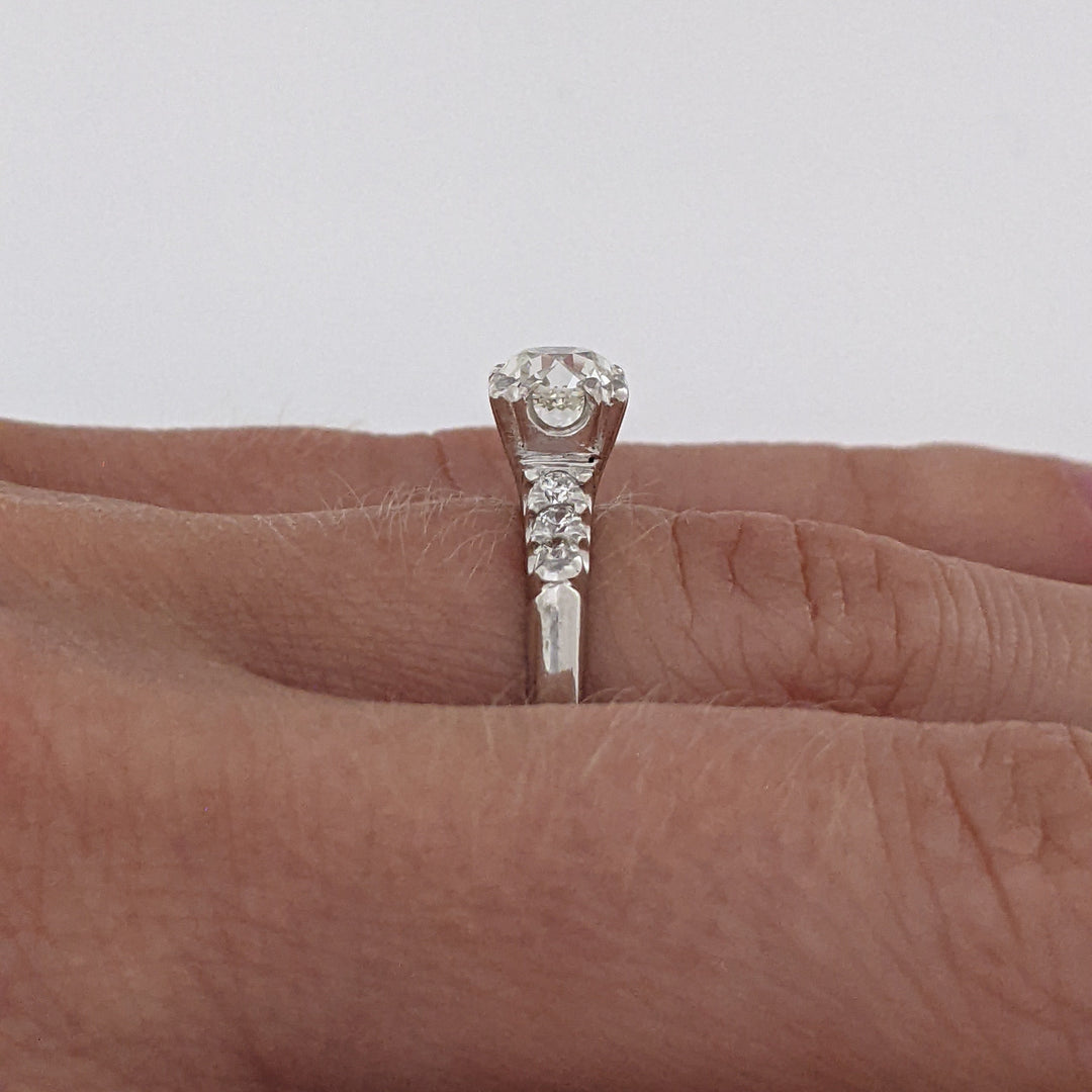 PLATINUM .72 CARAT TOTAL VS2 J DIAMOND ROUND WITH .12 DIAMOND TOTAL WEIGHT ESTATE RING 3.9 GRAMS