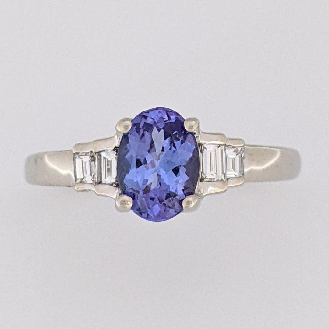 14K WHITE TANZANITE OVAL 5X7 WITH .18 DIAMOND TOTAL WEIGHT (4) EMERALD CUT ESTATE RING 2.2 GRAMS